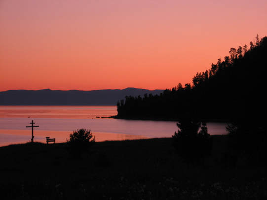 View at sunset from Barguzinsky Zapovednik, across Lake Baikal, to mountains on far shore above Baikalo-Lensky Zapovednik (photo Strebeigh)